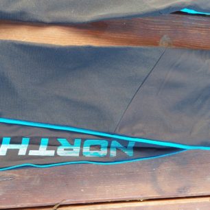 Široký zapínací klín na nohavicích pro přetažení přes lyžáky - NORTHFINDER DERESE