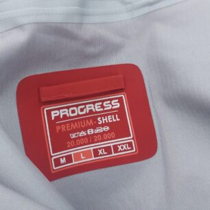 Vnitřní etiketa a poutko na zavěšení - PROGRESS ALPEN JKT
