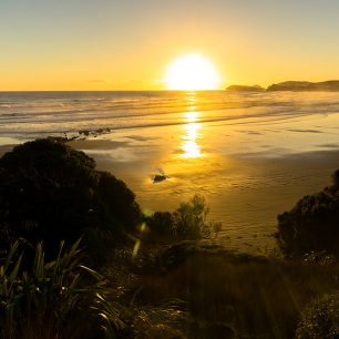 Západ slunce nad oceánem, Nový Zéland